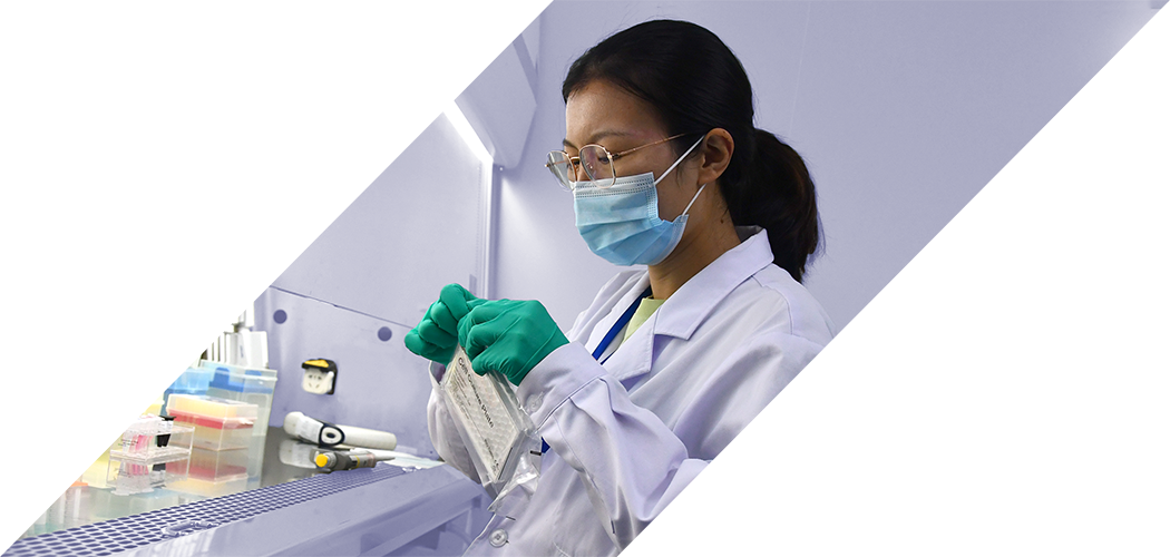 Female scientist handling testing contents