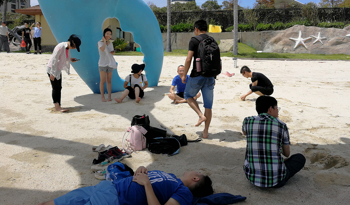 Ractigen team members enjoying a day at the beach